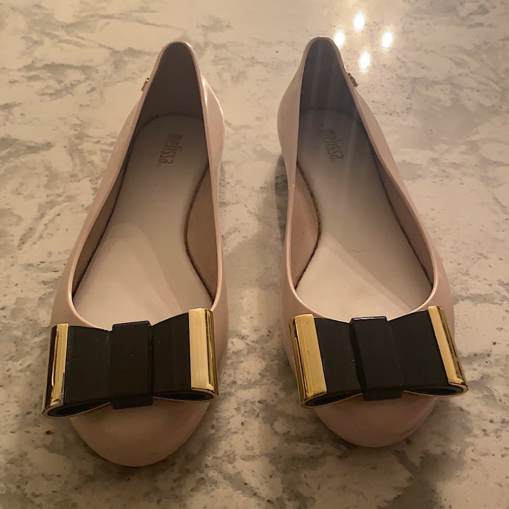High end Melissa with gold bow